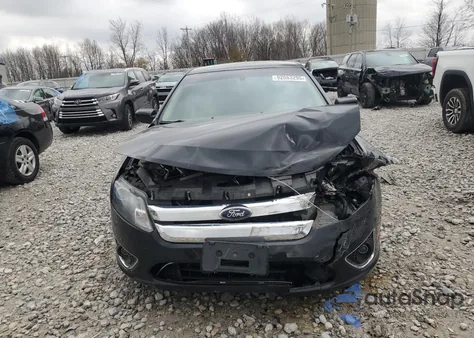 2012 Ford Fusion Hybrid из США, поврежденный, VIN 3FADP0L31CR447434